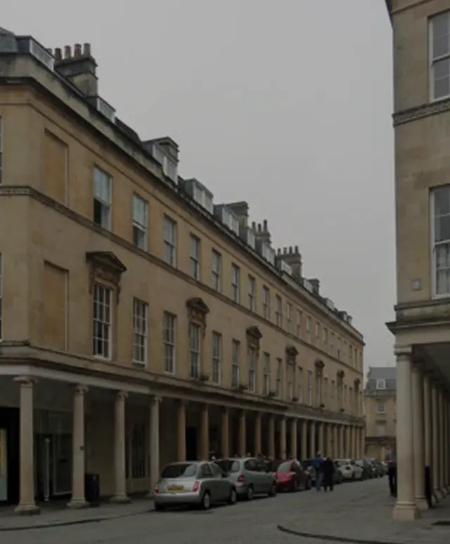 Georgian-style street lined with pillars and townhouses