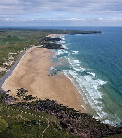 Stunning Wales landscapes on screen, highlighting rolling hills, lakes, and rugged coastline.